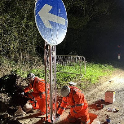 Installing motorway signage